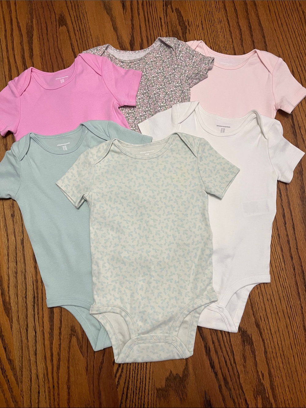 Pack of 6 Short-Sleeve Baby Onesies in Pink, Light Blue, White, Mint & Floral